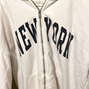 white brandy melville zip up hoodie